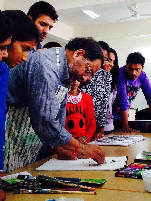 Students learning sketching by renowned artist Mr. Ravinder Sharma